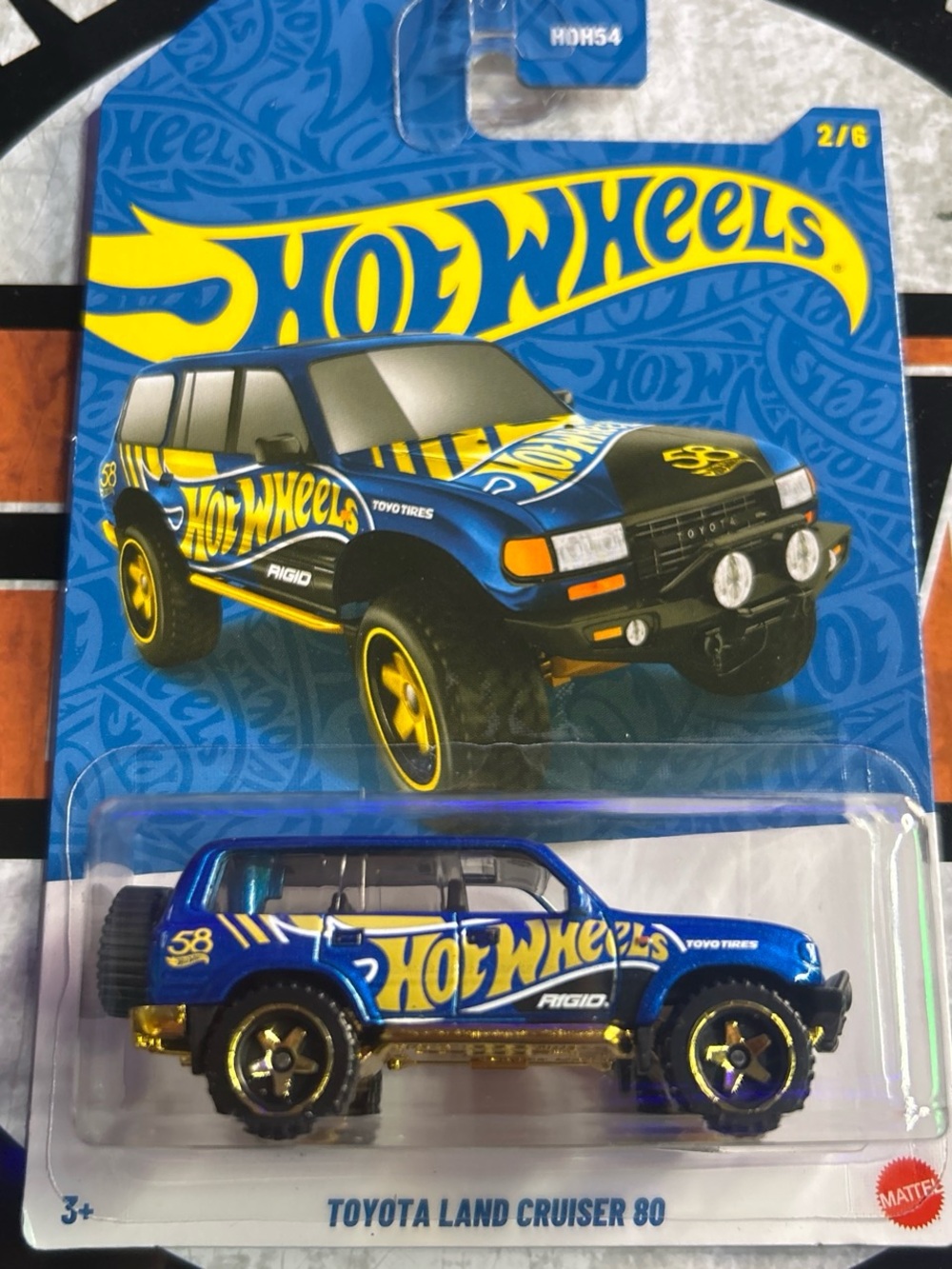 Hot Wheels Toyota Land Cruiser 80 Toy Car — Blue & Yellow